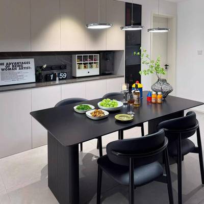 2025新款黑岩板餐桌椅组合现代意式家用轻奢饭桌长方形小户型简约