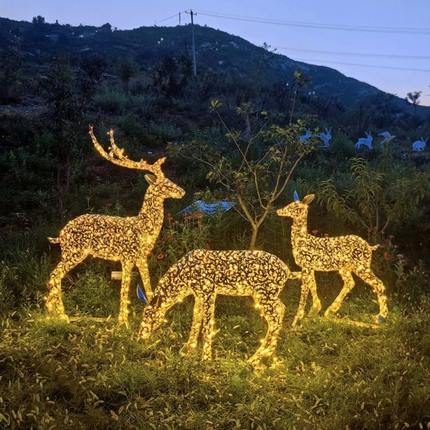 户外镂空梅花鹿不锈钢雕塑发光鹿造型灯亮化景观大型动物草坪摆件