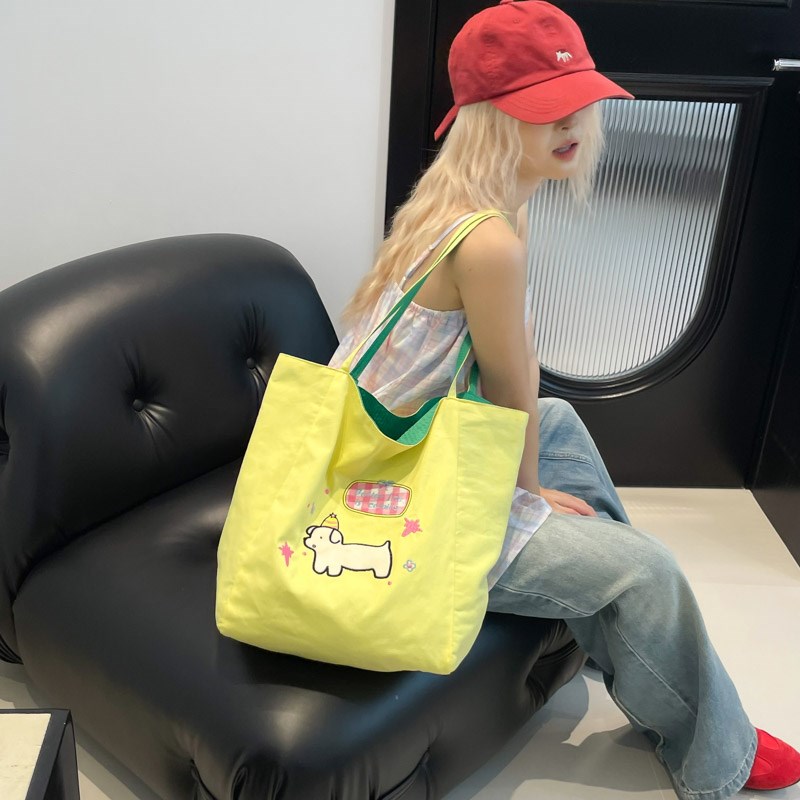 韩版可爱小狗大容量托特包2025新款时尚通勤帆布包休闲百搭单肩包