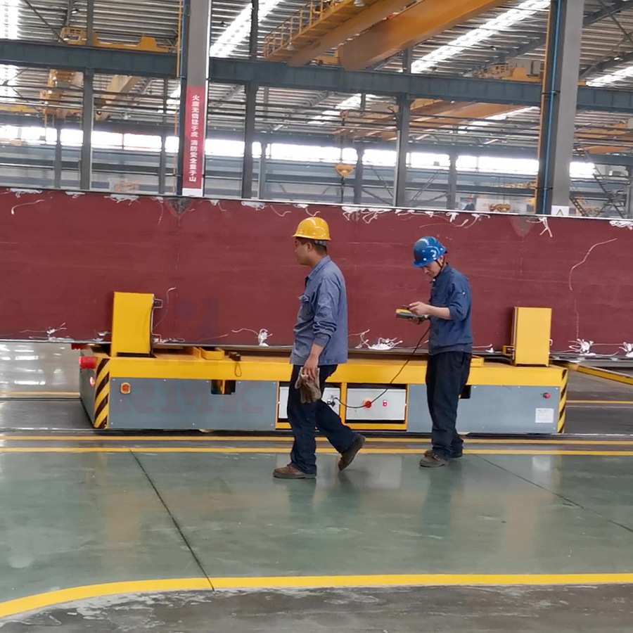 清洗机牵引式平板过跨地平车钢卷运输平台车遥控移动升降平台车