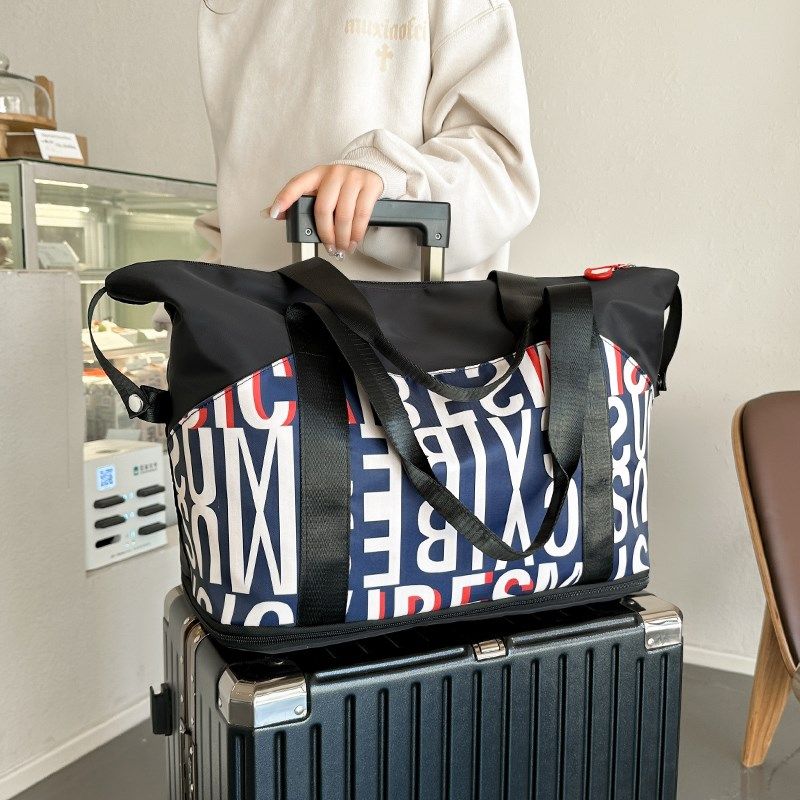 大容量手提旅行包女行李包男短途出差旅游包运动健身X包收纳登机