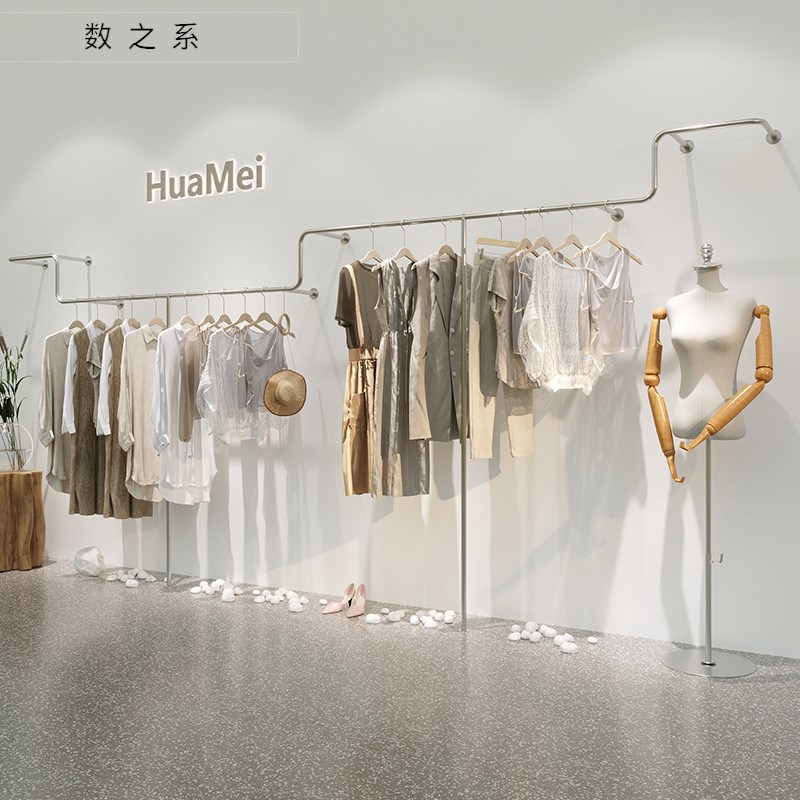 服装店展示架上墙壁挂式女装店不锈钢异型挂衣货架服装店设计