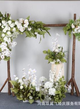 森系绿植婚庆布置白色小清新婚礼花艺舞台背景装饰路引地排花点花