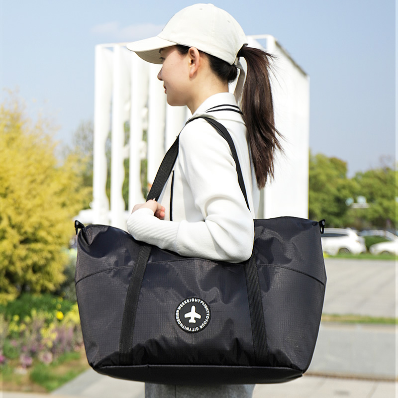 旅行收纳袋防水衣物整理袋可携式大容量手提包套行李箱拉杆旅行袋