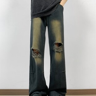 覆古的破洞扎染牛仔裤的男人和女人,苗条的夏天薄宽松直阔腿高街
