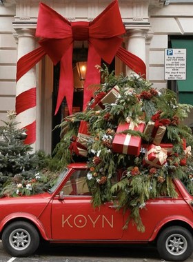 新年大型丝绒布蝴蝶结装饰道具店铺橱窗户外O门头节日氛围布置圣