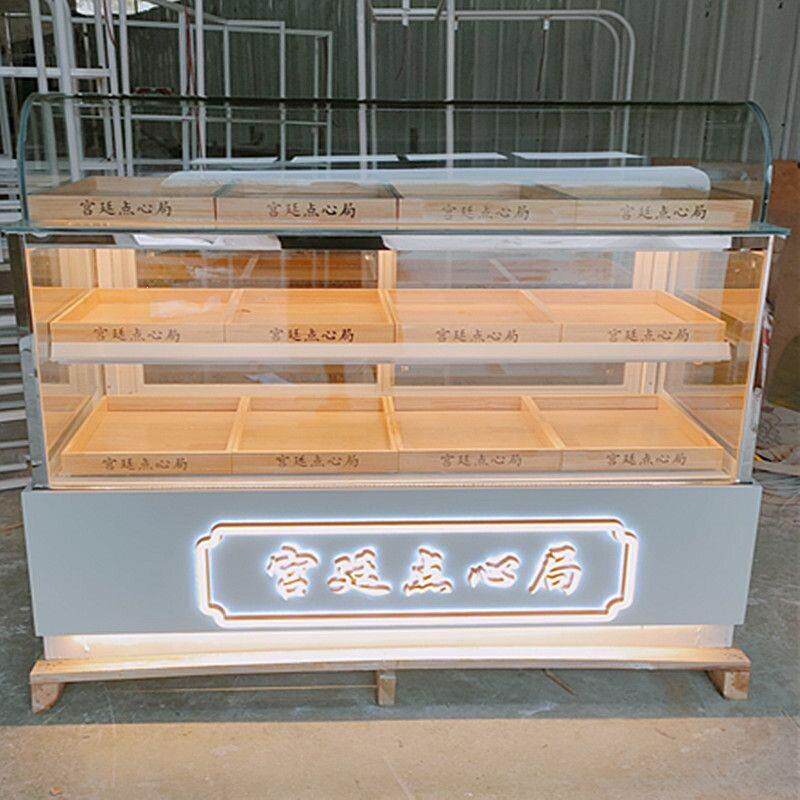 糕点展示柜面包柜弧形蛋糕柜台玻璃商用面包柜桃酥展柜陈列货架木图片