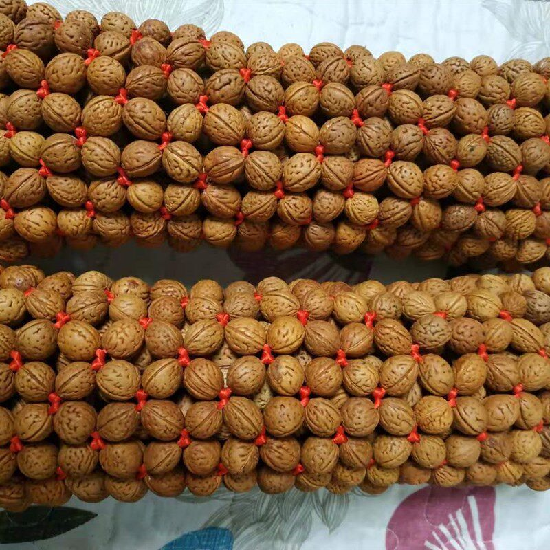 田园山核桃颈椎保健枕矫正牵引纯手工编织野生山桃核枕头包邮