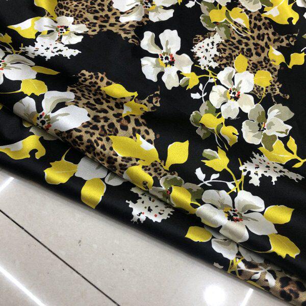 黑底真丝缎喷绘桑蚕丝面料黄白花豹纹图弹力丝绸19姆米宽幅布料