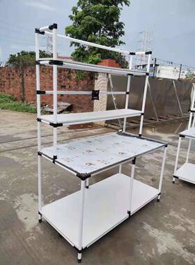 纯白色精益打仓包304不锈钢台面电商台打管包台线SH-GZT-8棒储货