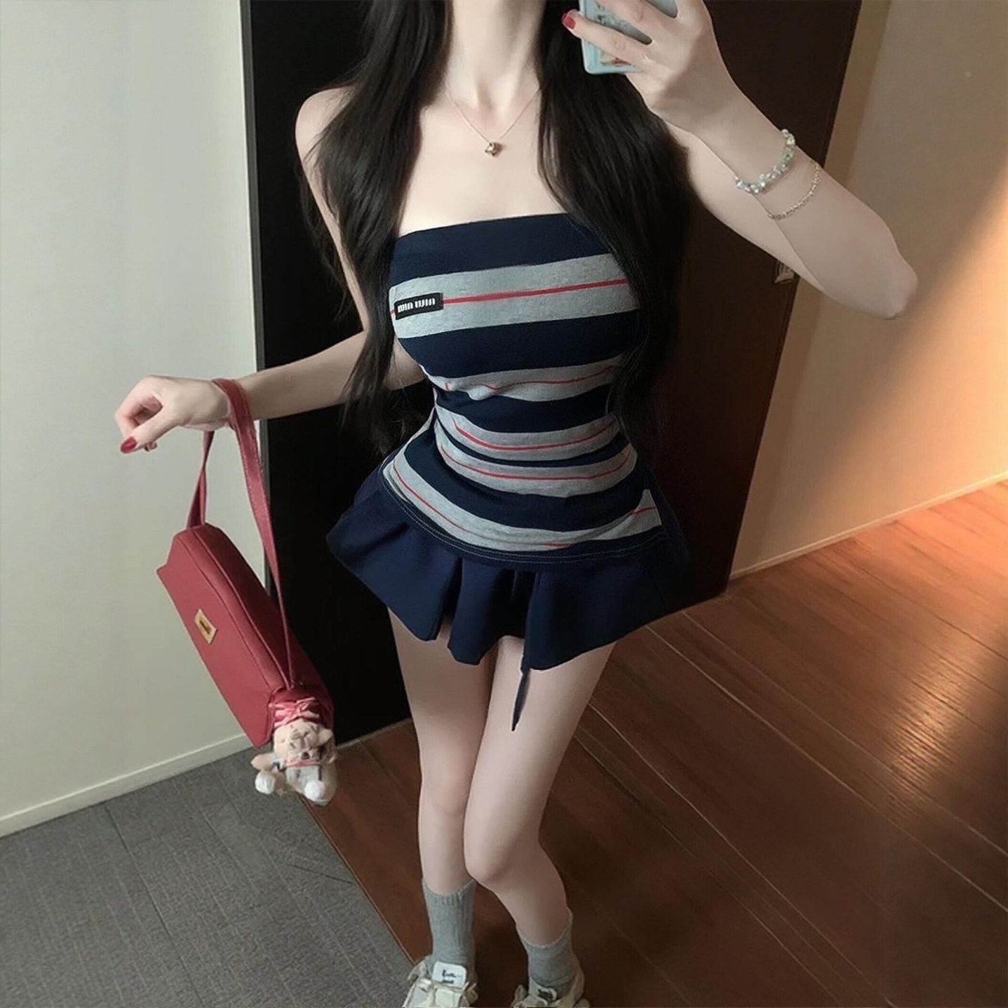 纯欲条纹抹胸上衣藏青短裙两件套女夏季辣妹收腰显瘦百褶裙套装