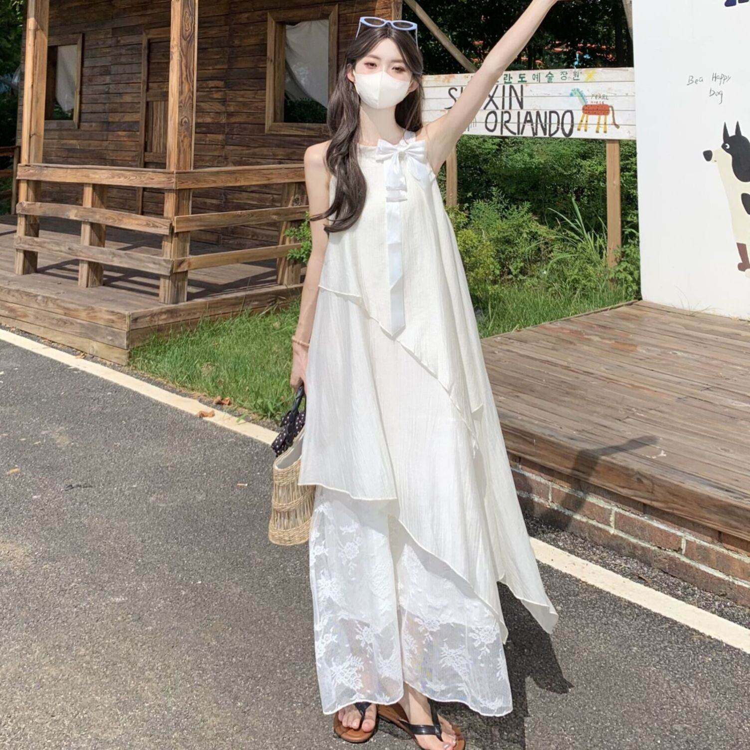 韩版设计感蝴蝶结背心连衣裙女2026夏季新款不规则网纱拼接长裙子