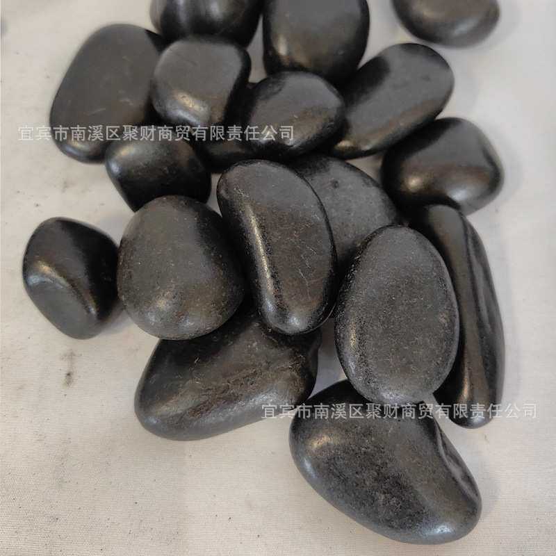 黑色石头抛光鹅卵石烧烤石铺地园林景观造景石工程河卵石厂家