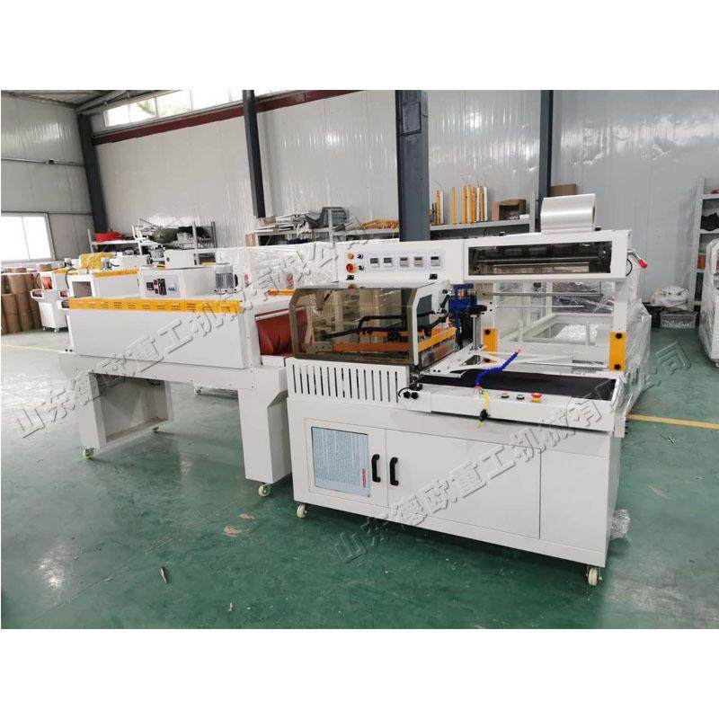 红酒礼盒热收缩包装机 机械配件薄膜裹紧机 办公文具收缩包裹机