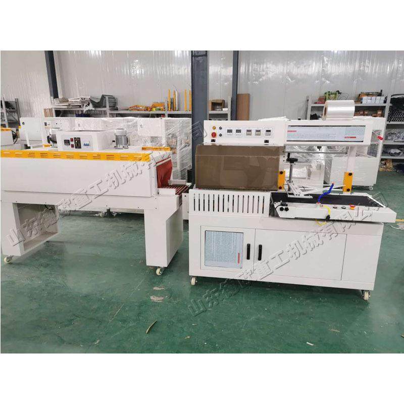 红酒礼盒热收缩包装机 机械配件薄膜裹紧机 办公文具收缩包裹机