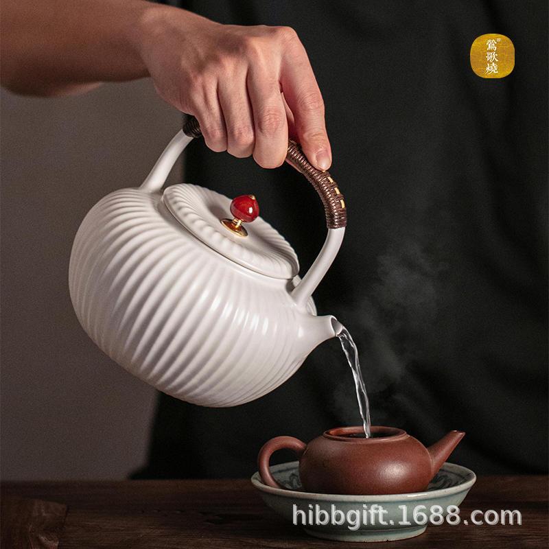 新品莺歌烧陶壶煮茶壶雪花釉菱瓣白泥壶烧水茶提梁壶