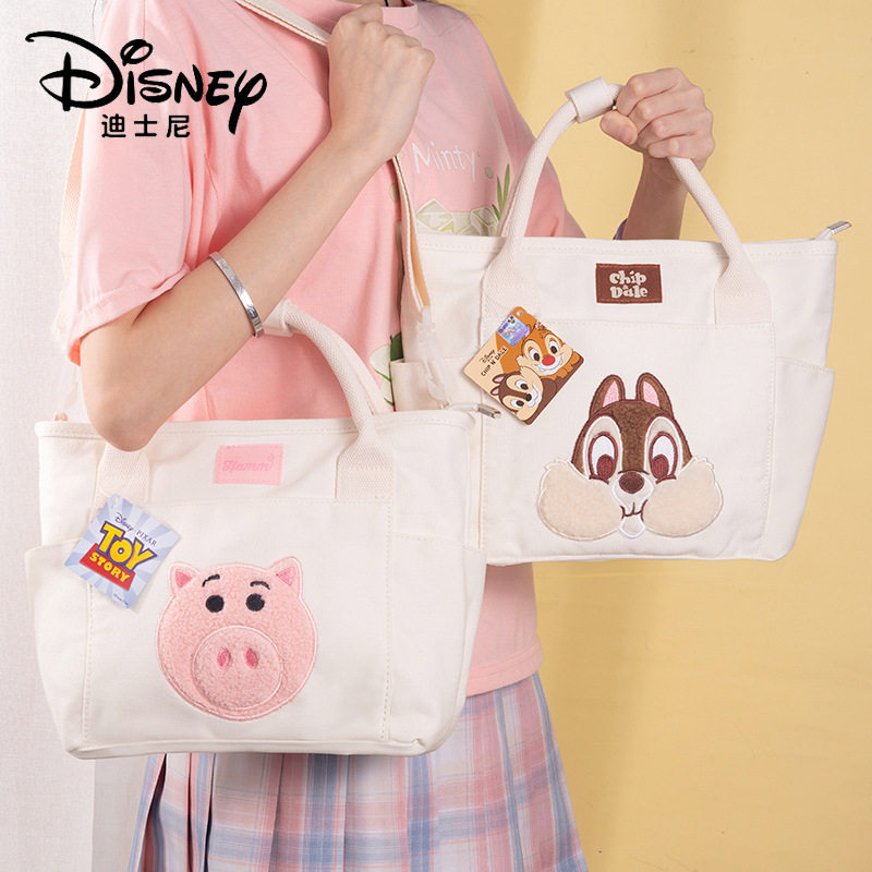 正版奇奇斜挎包抱抱龙熊猫小美可