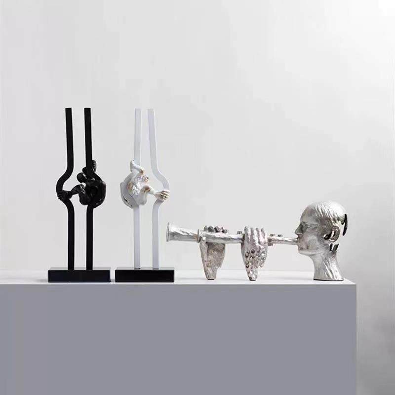 现代简约创意吹笛子奏乐人物雕塑金属摆件玄关书房酒店软装家居装