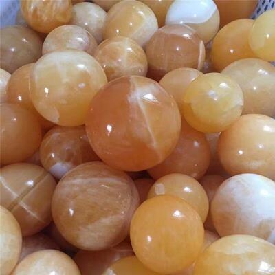 跨卖境热天然24315水晶石球黄色方解摆件晶洞石打圆磨球摆件装饰