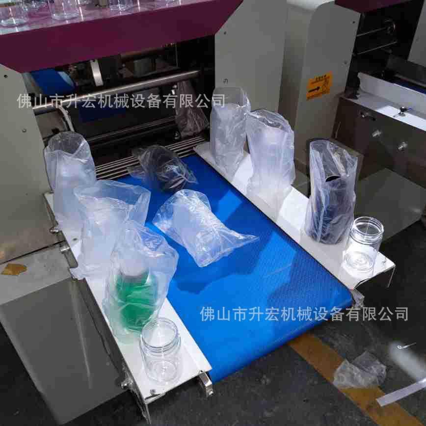 妆三服塑料WPB瓶子套袋机化瓶全自动功自动枕式伺包装机打包机多