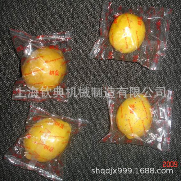 四川金橘饼袋装枕式包装机高速糖桔饼背封枕式包装机