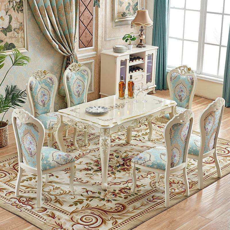 欧式餐桌椅组合北欧实木长方形家用2026年新款白色小户型吃饭桌子