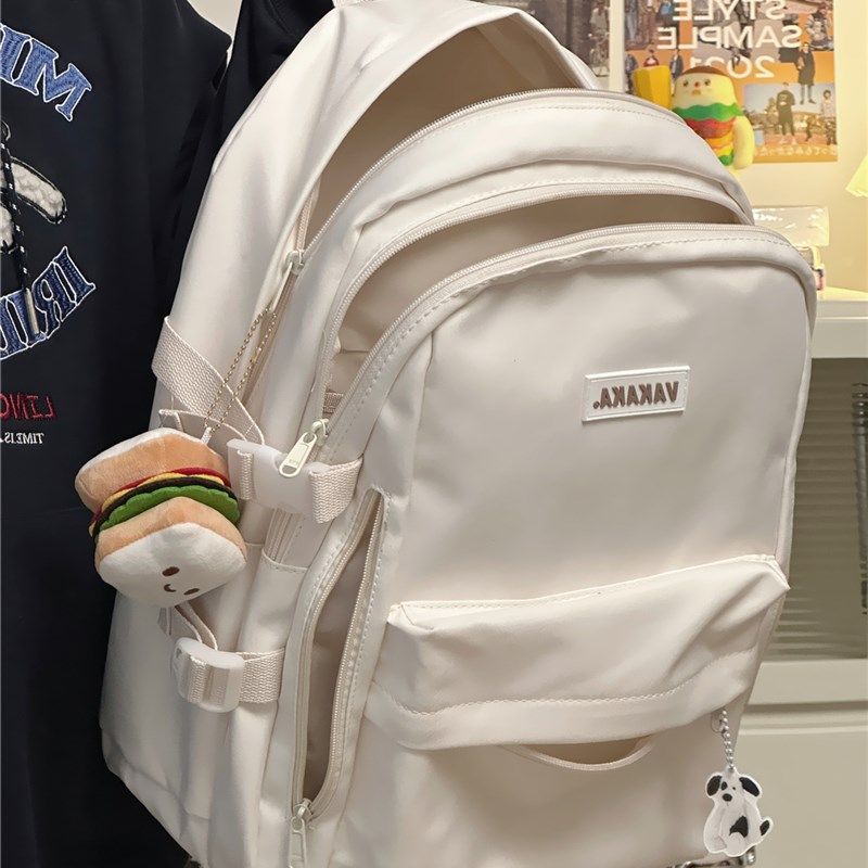 日韩式简约风纯白色栗的茶话会书包女大学生高中双肩包多层大容量图片