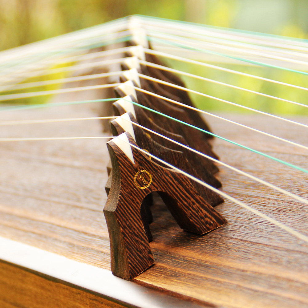 古筝配件 1-21号全黑鸡翅檀木筝码琴码雁柱 手工牛骨 加厚加宽 - 封面