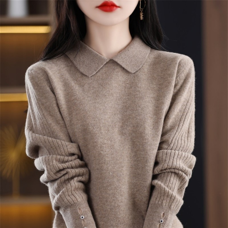 设计感袖口镂空针织衫女毛衣秋冬季新款娃娃领显瘦气质打底羊毛衫