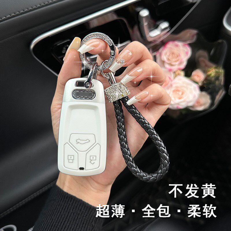 适用奥迪车钥匙套23-24新款A4LQ5LA5高级感车用壳女士汽车挂件扣
