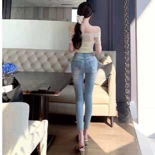 剪裁腰细胯宽蓝色高腰紧身牛仔裤 性感斜扣小脚韩国东大门时牛仔裤