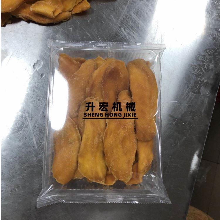 广QMD西芒果干装干机百色芒果干包装机蔬果干自动封包口菠机萝包