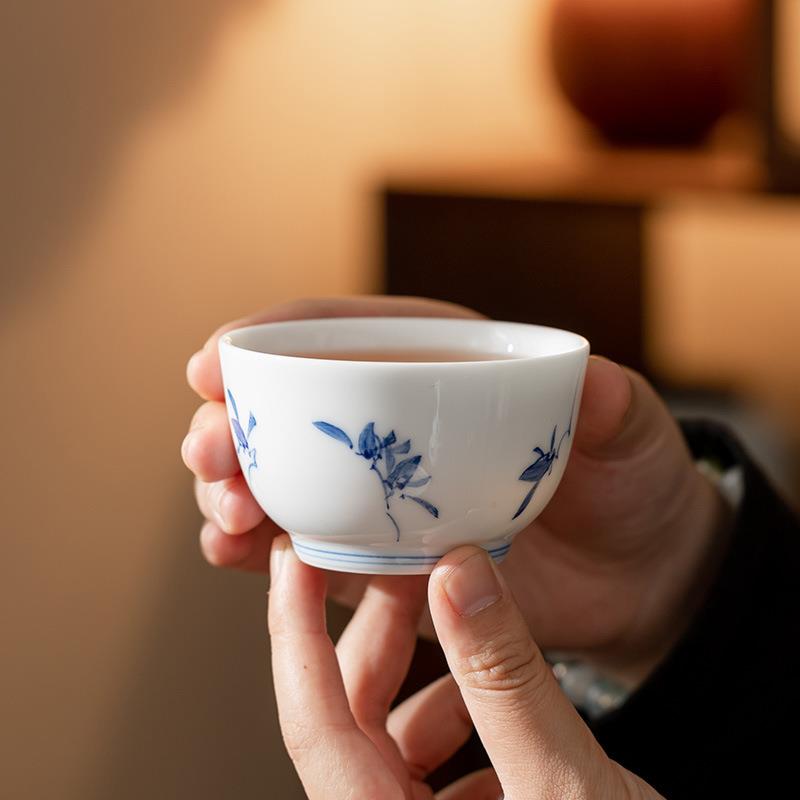 釉下纯手绘蝴蝶兰主人杯羊脂玉猪油白茶具品茗杯家用喝茶杯压手杯