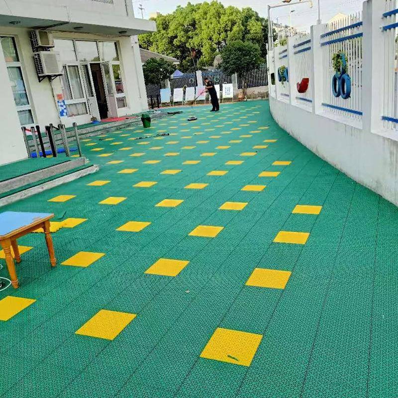 球悬浮地板篮运场JWN悬浮式运动拼装塑料厂家动场专用防水户外防