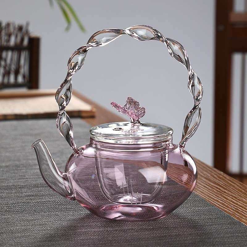 粉色扭扭把壶厂家供应高硼硅玻璃提梁茶壶电陶炉加热蝴蝶壶茶具