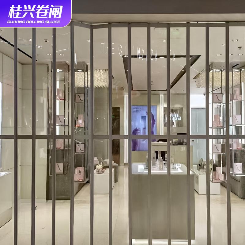 折叠门推拉门隐形铝合金水晶商铺商场透明阻隔遥控门车库门图片