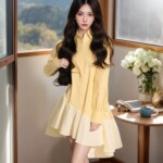不规则拼接黄色衬衫连衣裙女春装2025新款宽松遮肉花苞蓬蓬短裙子