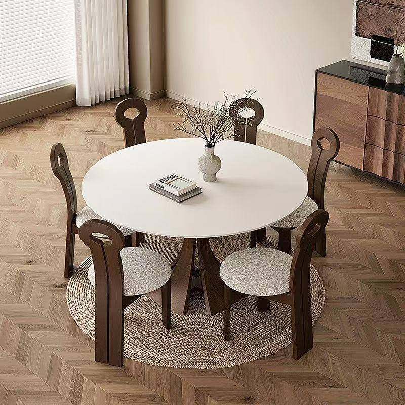 法式复古风洞石岩板餐桌椅组合家用圆形实木圆桌简约吃饭桌子