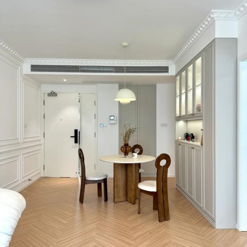 古韵雅奢法式中古风胡桃实木餐桌椅洞石岩板小圆桌家用小户型