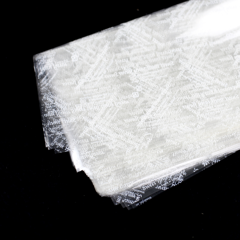 华信天诚 英文字母玻璃纸 透明塑料纸 蛋糕包装片 烘焙包装1斤