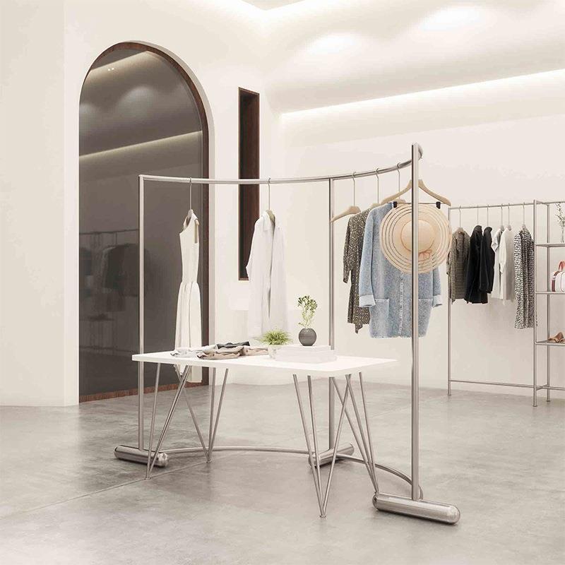 服装落店锈展示架创意弧不无品牌/钢地式中形岛架男女装童装店陈