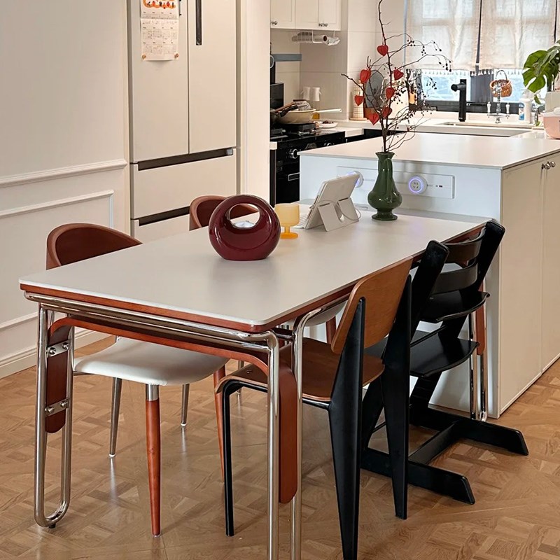 中古风岩板餐桌家用现代简约小户型不锈钢腿吃饭餐桌椅组合长方形