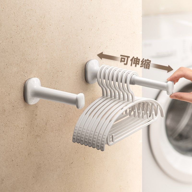 免钉胶衣架收纳架免打孔家用阳台墙上可伸缩晾衣架整理挂钩壁挂式