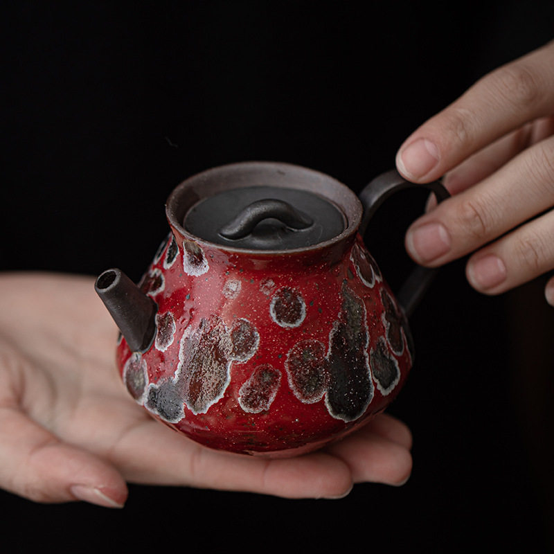 哪吒红釉窑变陶瓷手持茶托