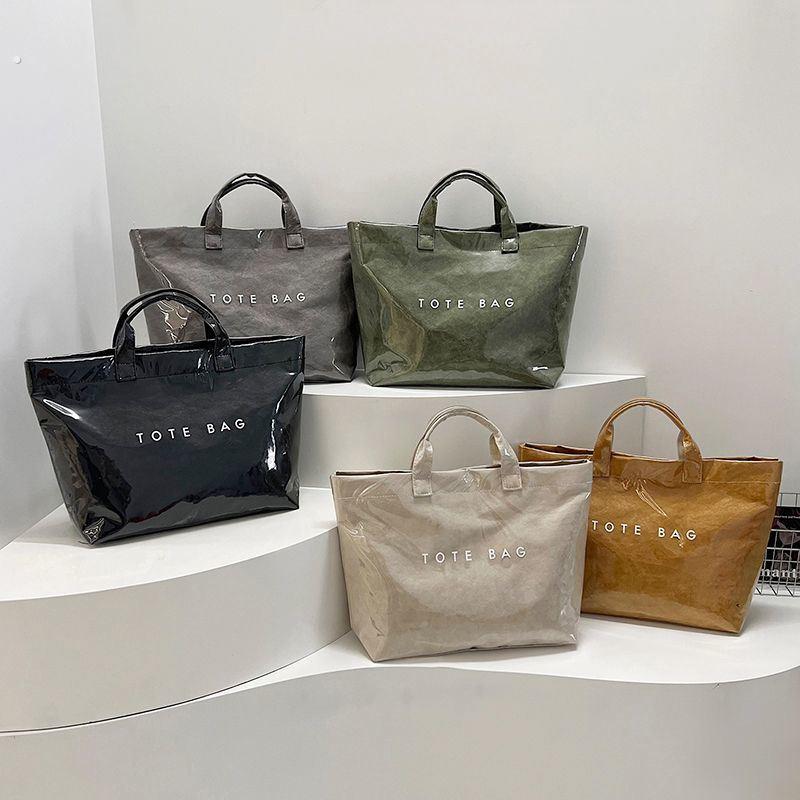 大容量杜邦纸果冻包时尚透明PVC防水手提袋上班通勤托 托特包妈咪