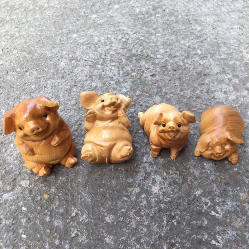 崖柏木雕四喜福猪茶宠摆件