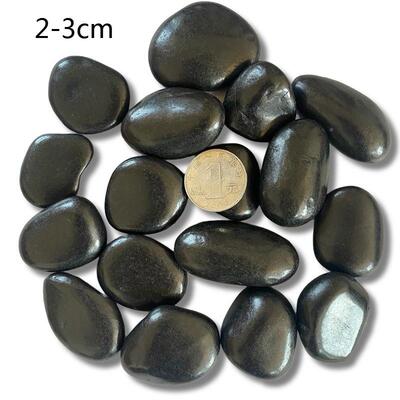 按吨黑色雨花24704石鹅卵石黑石园绿化子林石庭院排水石按摩石碎