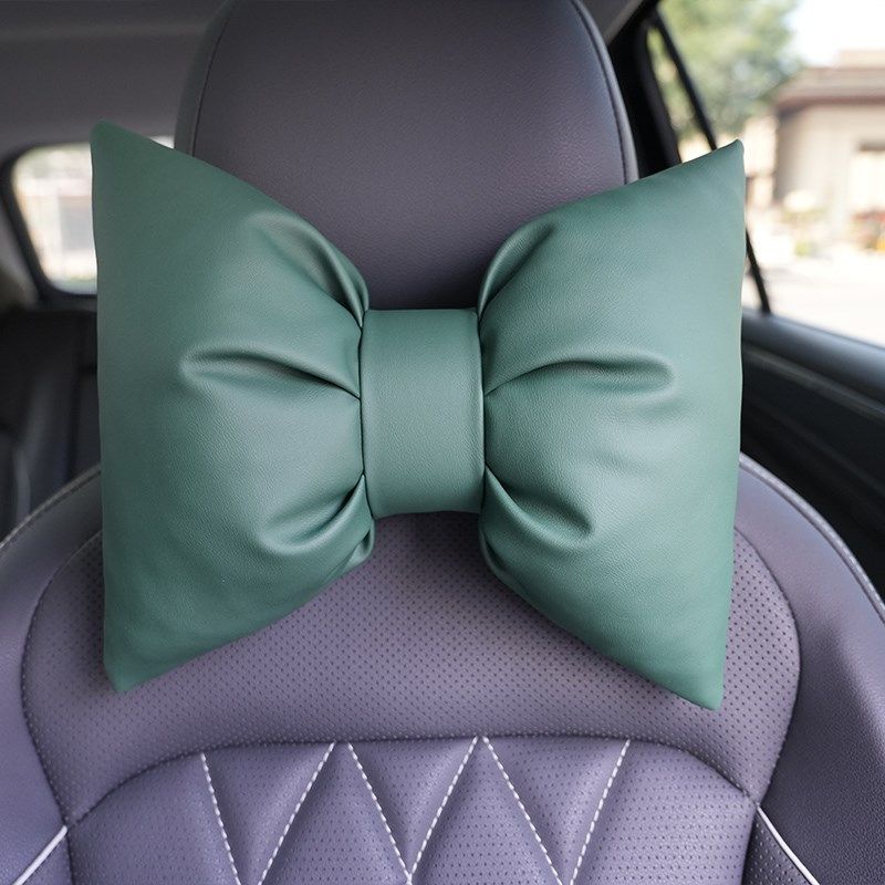 蓝色蝴蝶结汽车头枕绿色车用护颈枕女士车载颈枕四季通用皮革靠枕