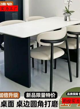 现代简约黑色岩板餐桌餐桌椅组合家用小户型长方形意式组合饭桌椅