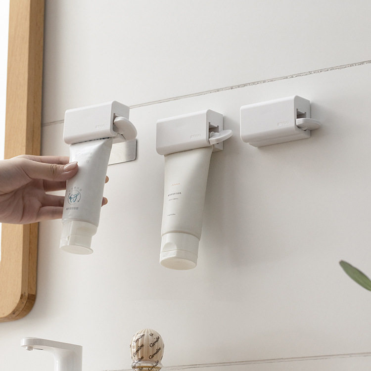 磁吸挤牙膏器牙膏夹壁挂洗面奶架懒人挤牙膏神器卫生间手动挤压器